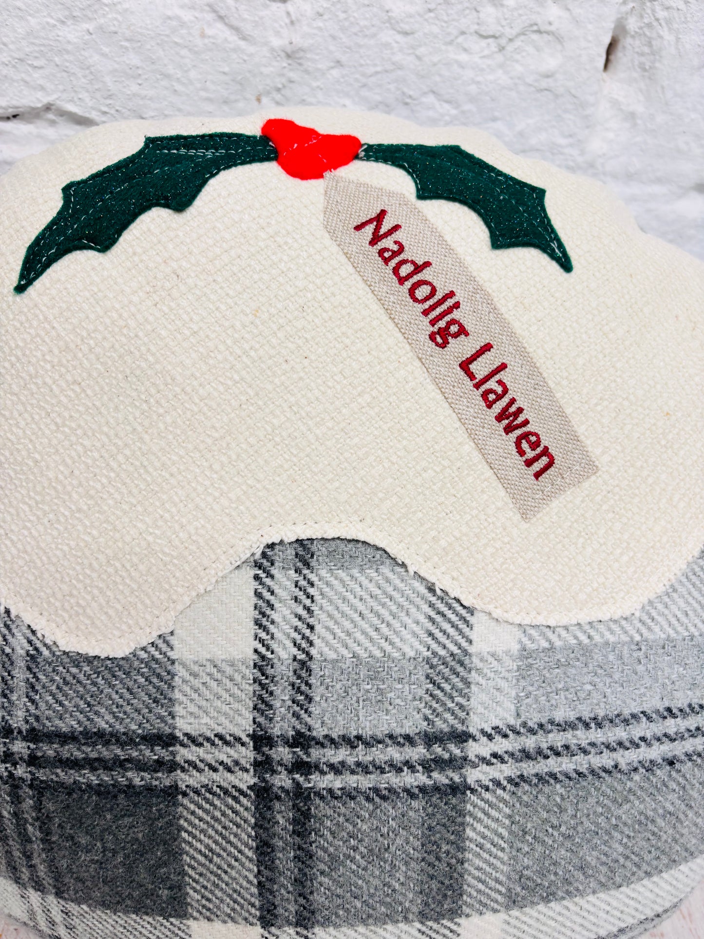 Christmas pudding  Nadolig llawen Grey Wool Cushion .