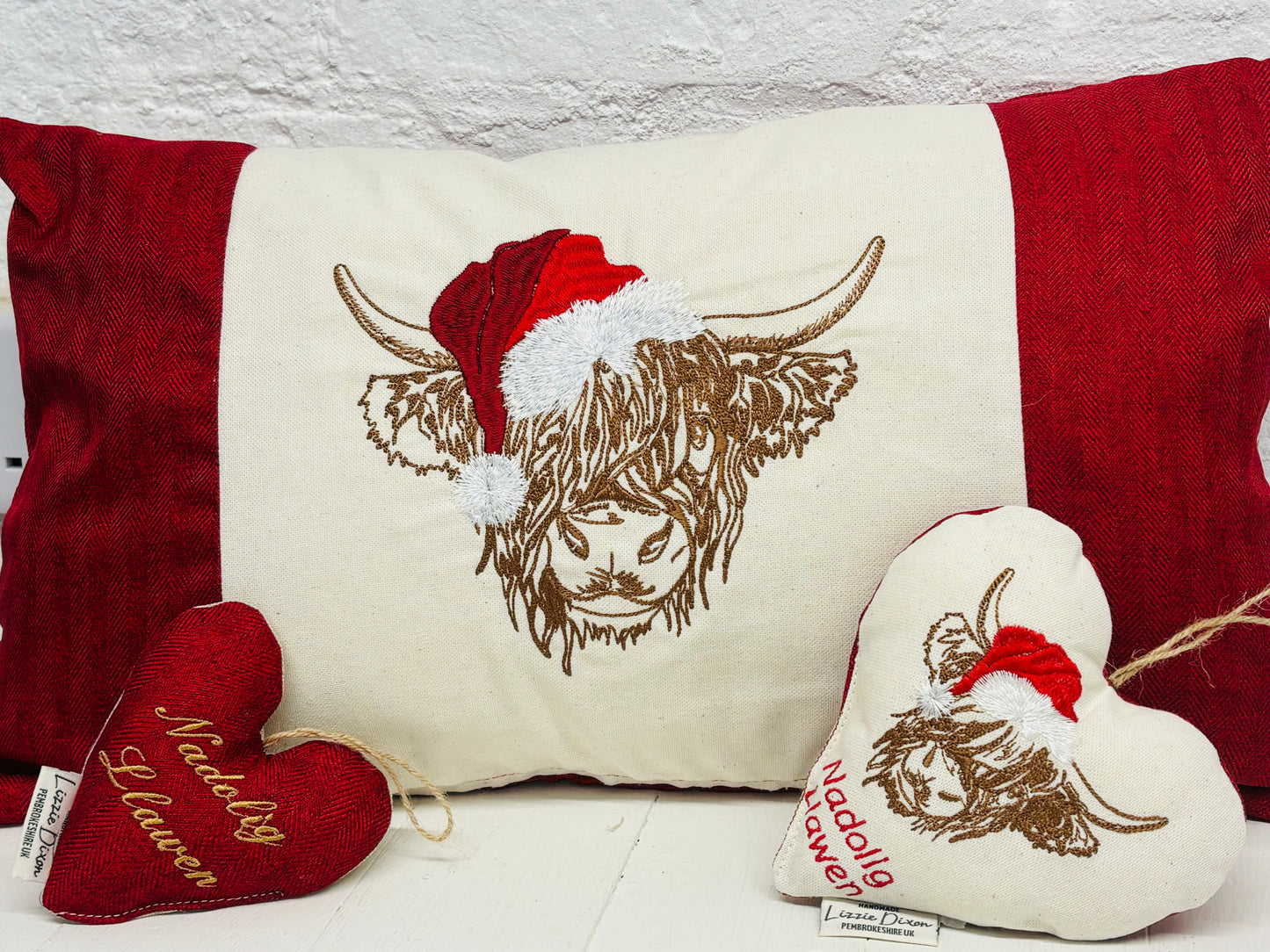 Festive Highland cow wearing Santa hat Hanging Heart