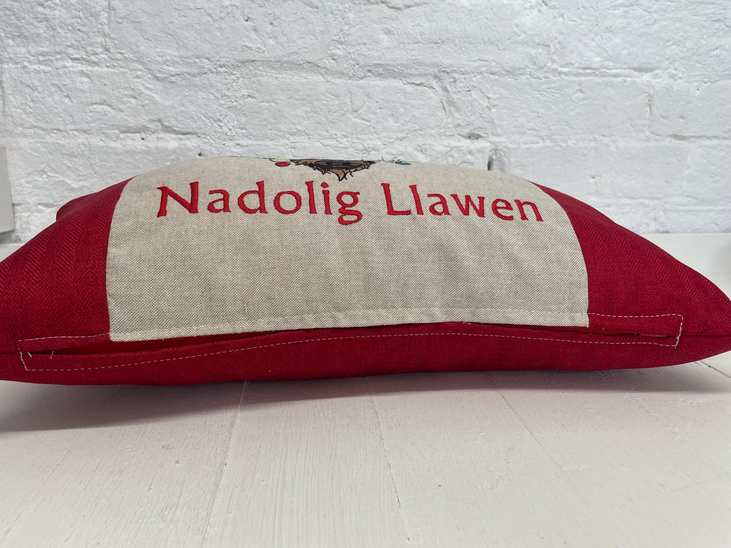Festive Highland Cow with slights - Nadolig Llawen-Merry Christmas. Red Tweed Fabric