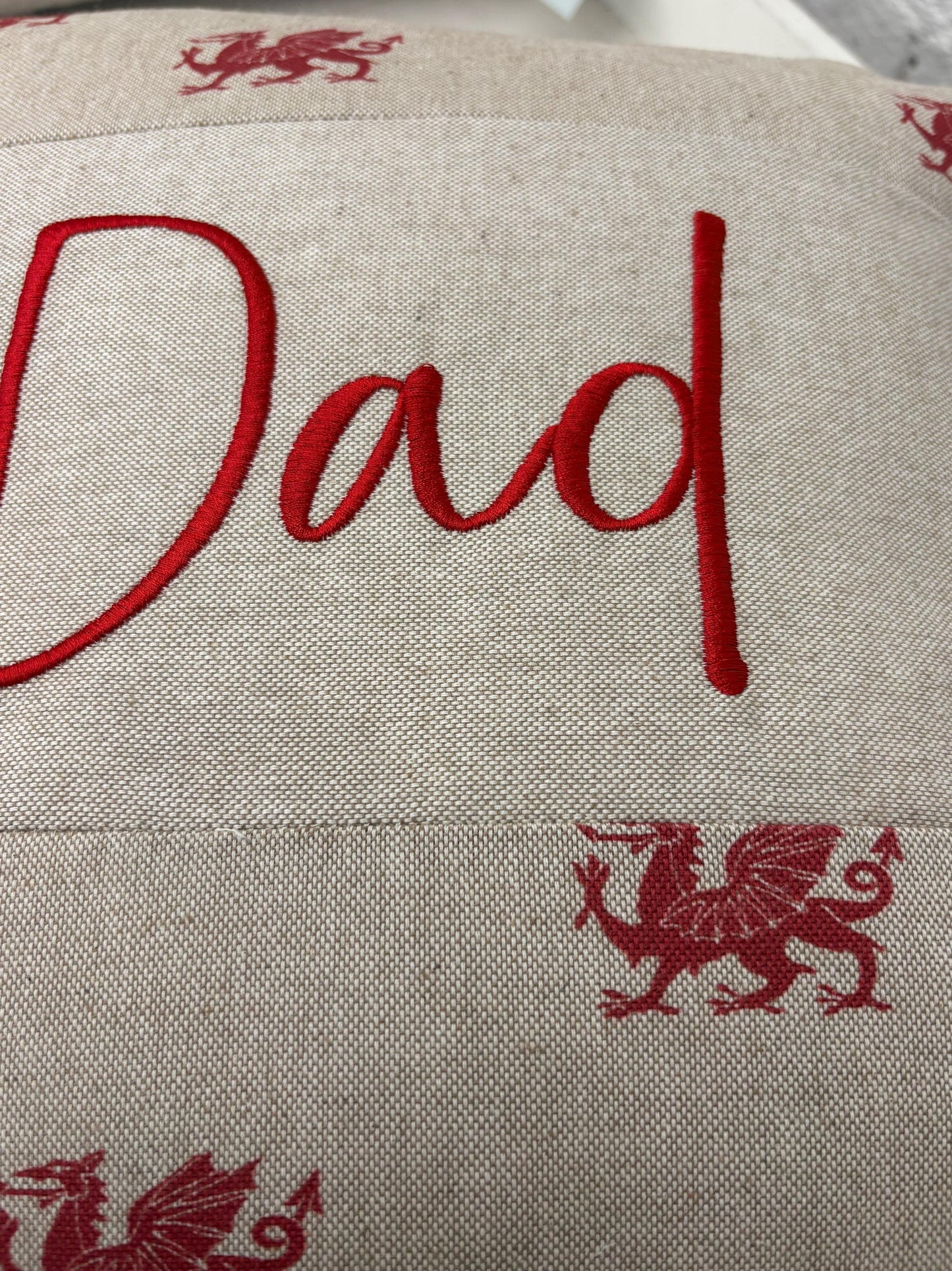 Tadcu Welsh Dragon Cushionlovely cushion with Welsh dragon fabric and the word Tadcu embroidered on a central panel. Father’s Day gift