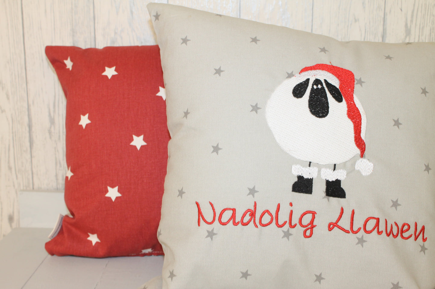 Grey Star Christmas Sheep Wearing Santa hat -
