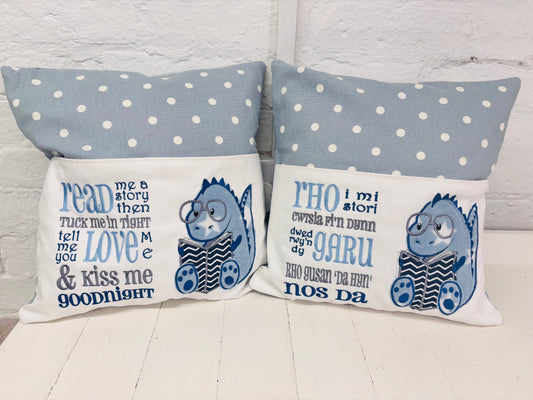 Blue Dino children’s Book Cushion available in Welsh or English.