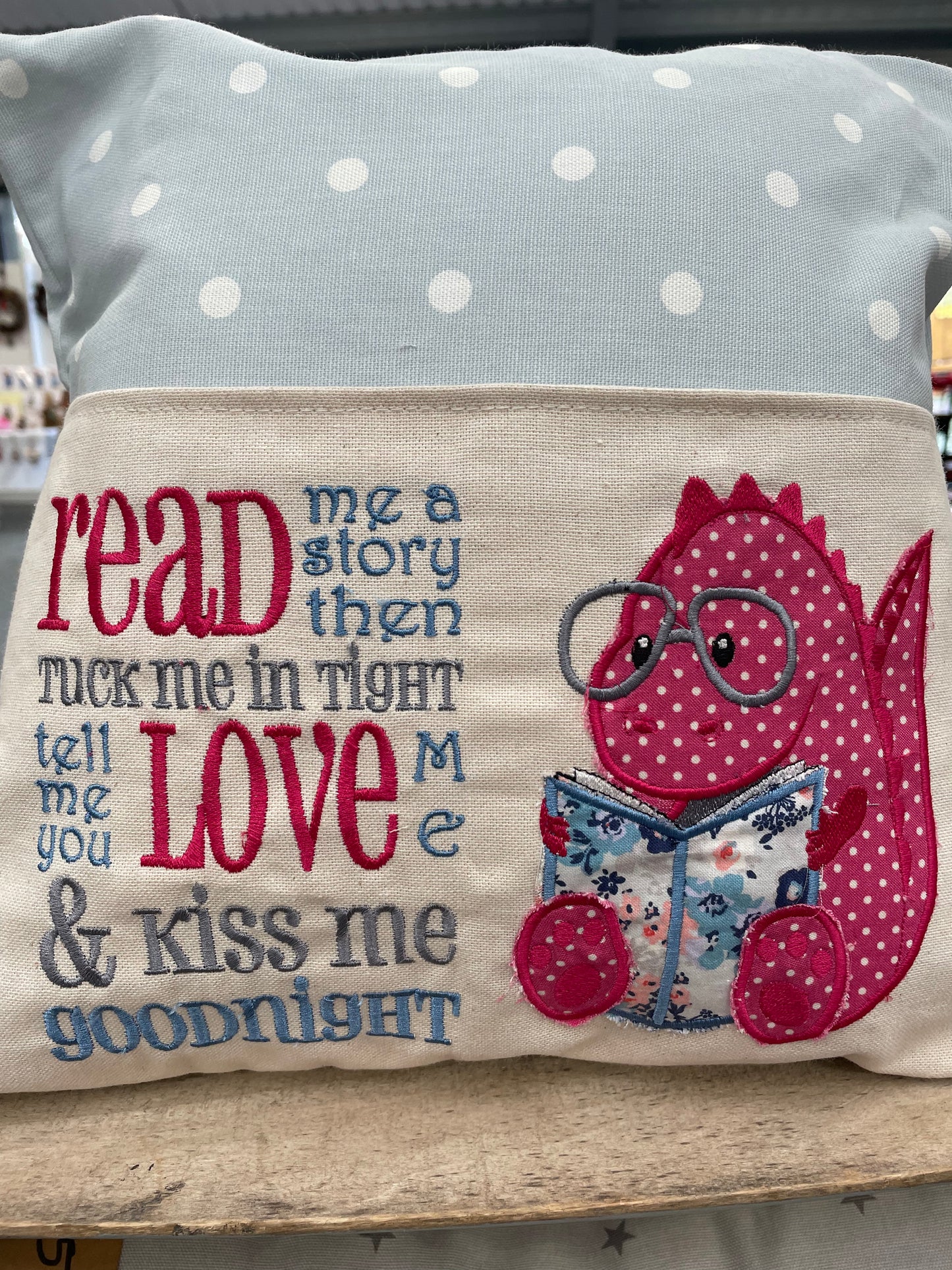 Blue and Pink Dino Children's Reading Book Cushion.