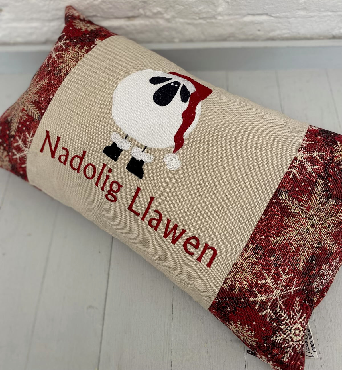 Festive Sheep Long Nadolig Llawen-Merry Christmas. Snow Flake Fabric