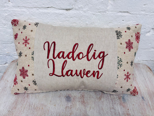 Nadolig Llawen Christmas Cushion- Snowflake Gold Snowflake Tapestry style cushion.
