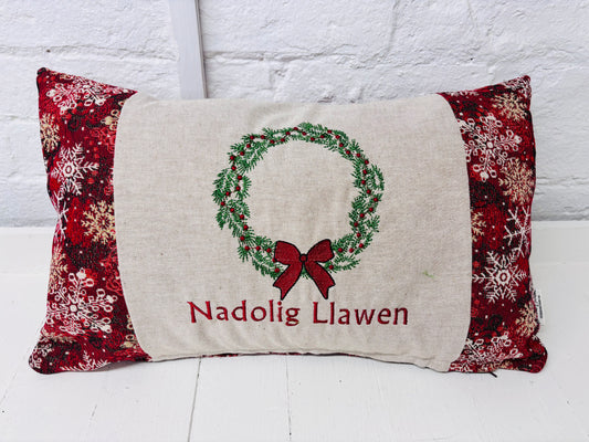 Christmas Wteath Nadolig llawen luxe Red and Gold Snowflake Cushion .