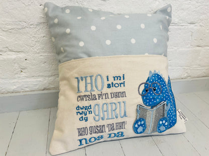 Welsh Blue Dino Children's Welsh Reading Book Cushion.