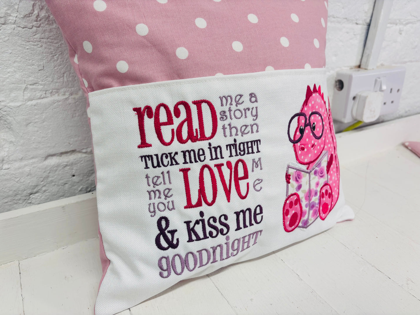 Pink Dino Children's Reading Book Cushion. available in Welsh and English