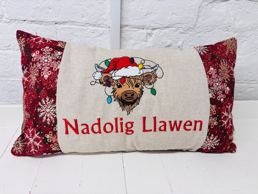 Festive Highland Cow with lights   - Nadolig Llawen-Merry Christmas. Red Snowflake Fabric