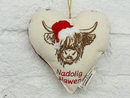 Festive Highland cow wearing Santa hat Hanging Heart