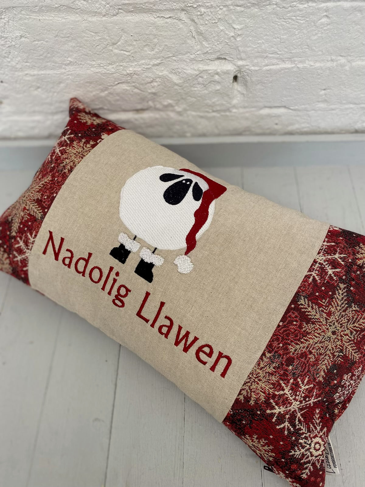 Festive Sheep Long Nadolig Llawen-Merry Christmas. Snow Flake Fabric