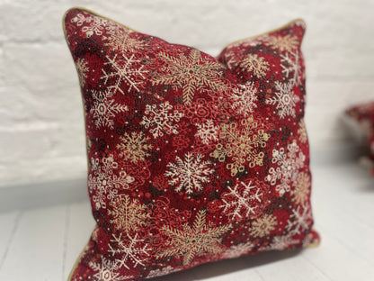 Snowflake Cushion with gold piping.