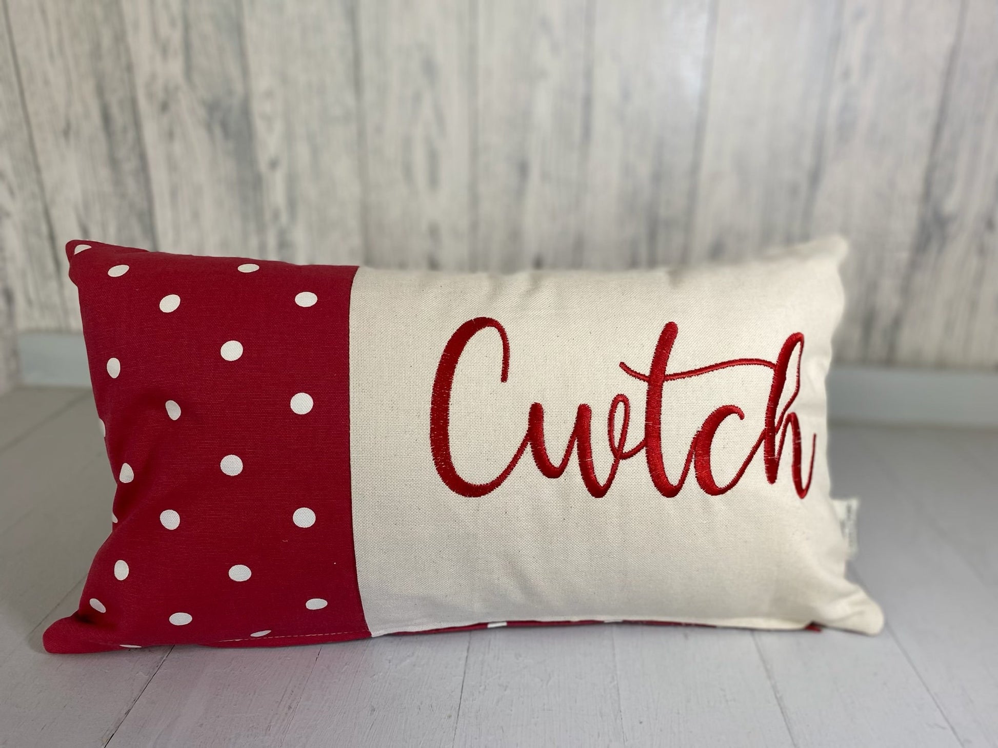 Cwtch Cushion-Personalised Cushion-Quote Cushion pretty Red dotty & Cream long cushion.