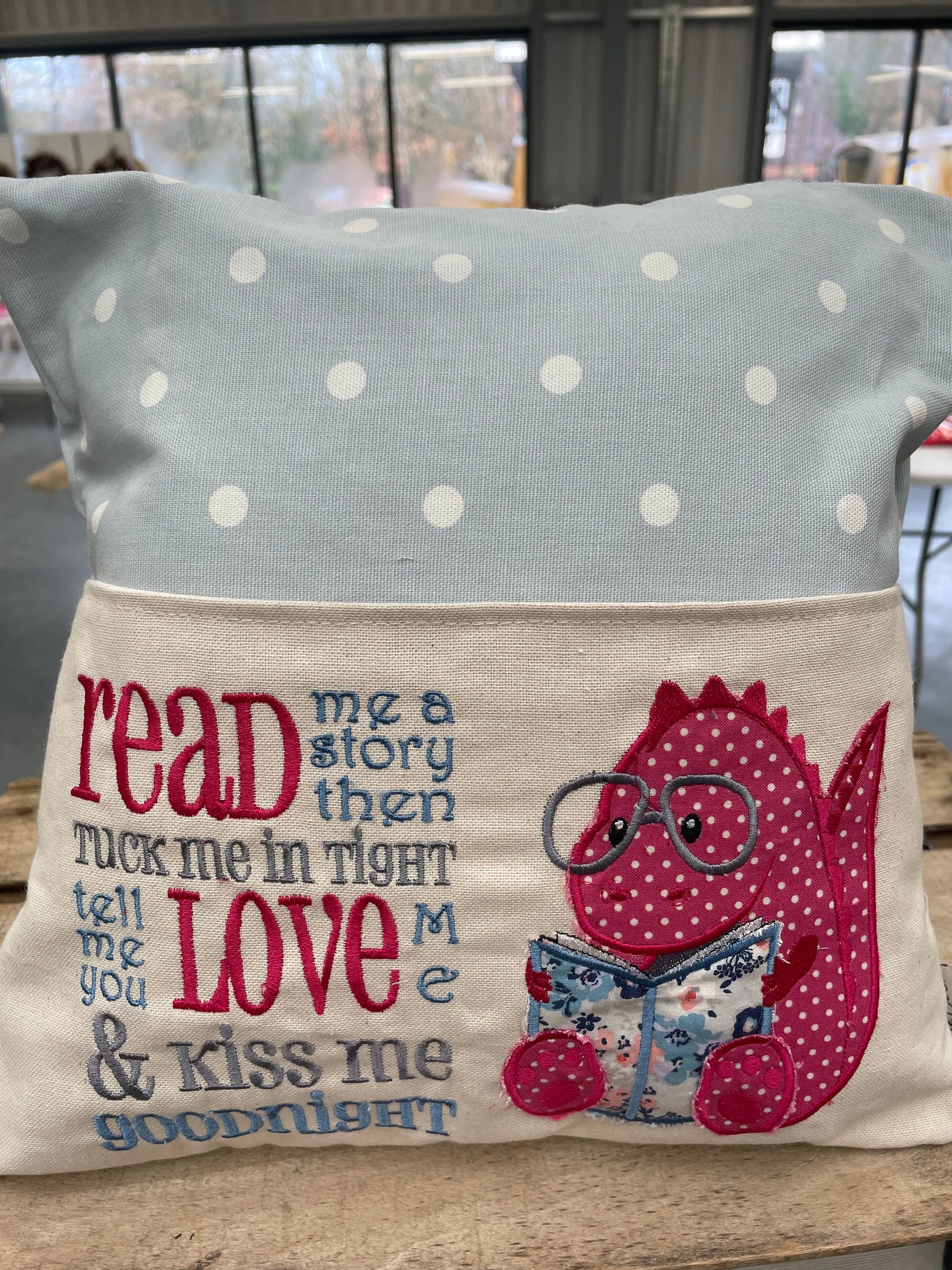 Blue and Pink Dino Children&#39;s Reading Book Cushion.