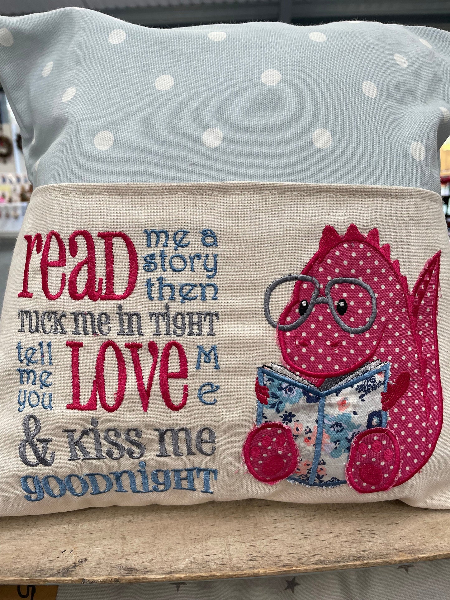 Blue and Pink Dino Children&#39;s Reading Book Cushion.