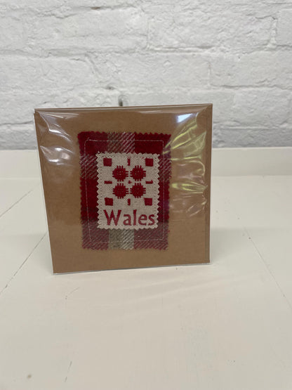 Handmade Card with machine embroidered Welsh blanket design on Red Wool Touch fabric square mounted on a Kraft card with envelope