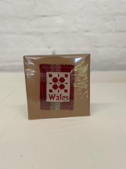 Handmade Card with machine embroidered Welsh blanket design on Red Wool Touch fabric square mounted on a Kraft card with envelope