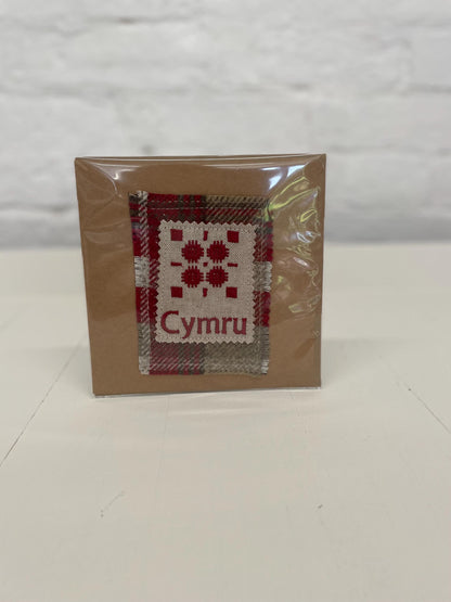 Handmade Card with machine embroidered Welsh blanket design & Cymru on Red Wool fabric square mounted on a Kraft card with envelope