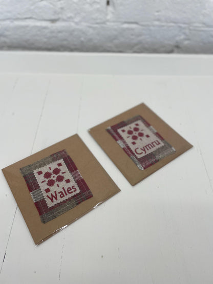 Handmade Card with machine embroidered Welsh blanket design & Cymru on Red Wool fabric square mounted on a Kraft card with envelope