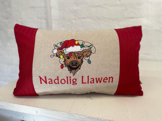 Festive Highland Cow with slights - Nadolig Llawen-Merry Christmas. Red Tweed Fabric