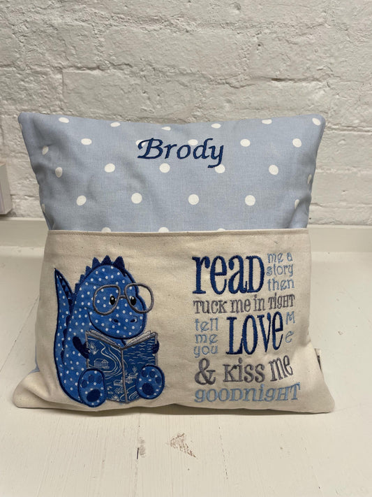 Cute dinosaur Children's Book Cushion available in Welsh and English