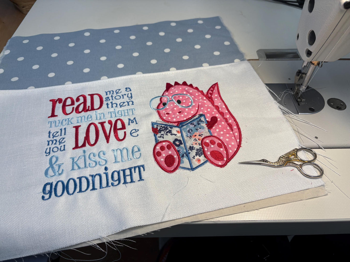 Cute dinosaur Children's Book Cushion available in Welsh and English
