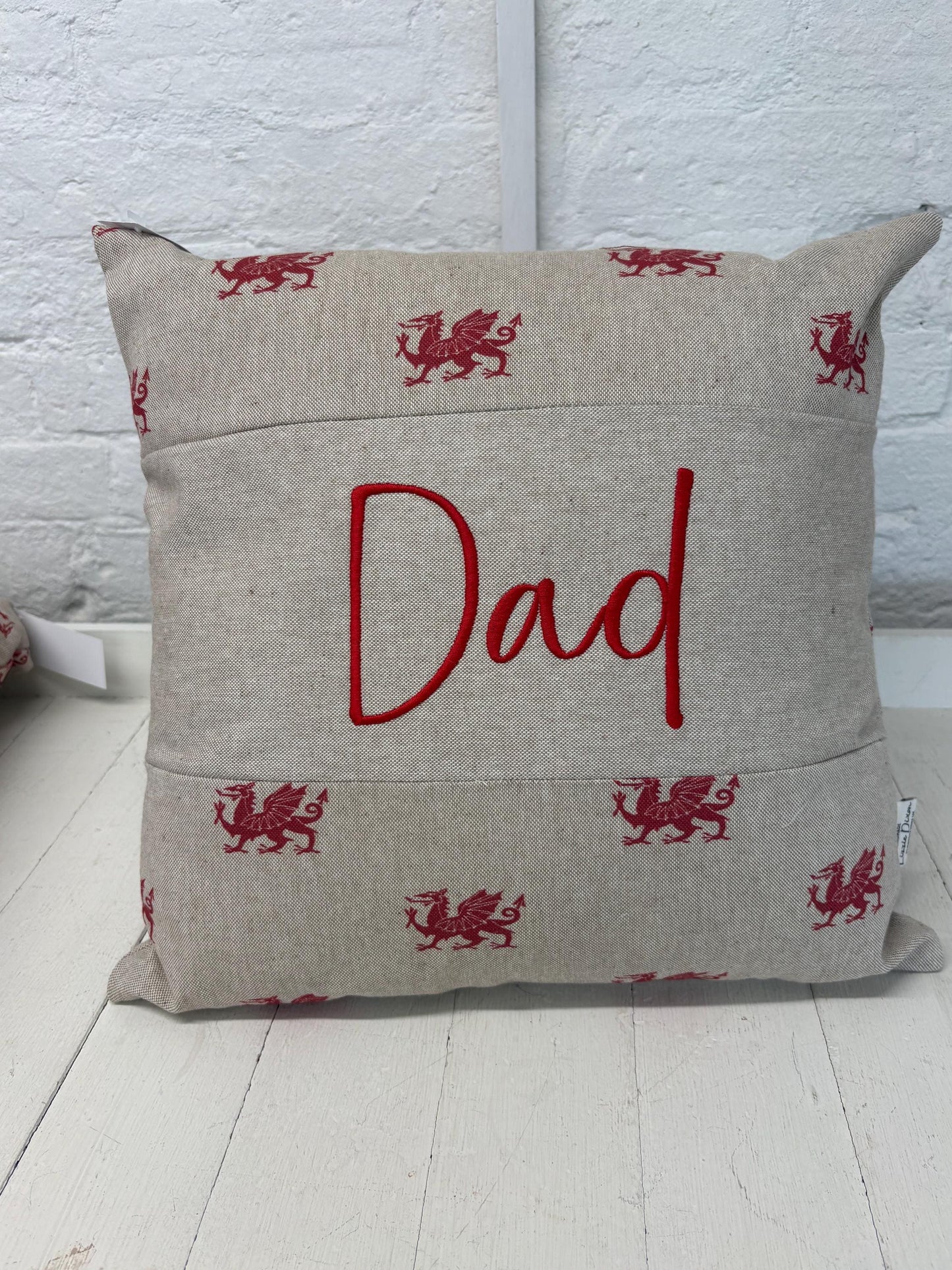 Dad Welsh Dragon Cushionlovely cushion with Welsh dragon fabric and the word Dad embroidered on a central panel. Father’s Day gift