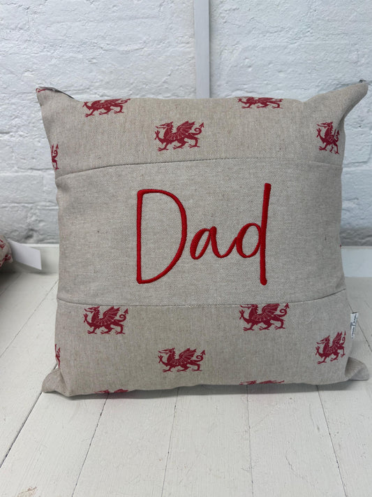 Dad Welsh Dragon Cushionlovely cushion with Welsh dragon fabric and the word Dad embroidered on a central panel. Father’s Day gift