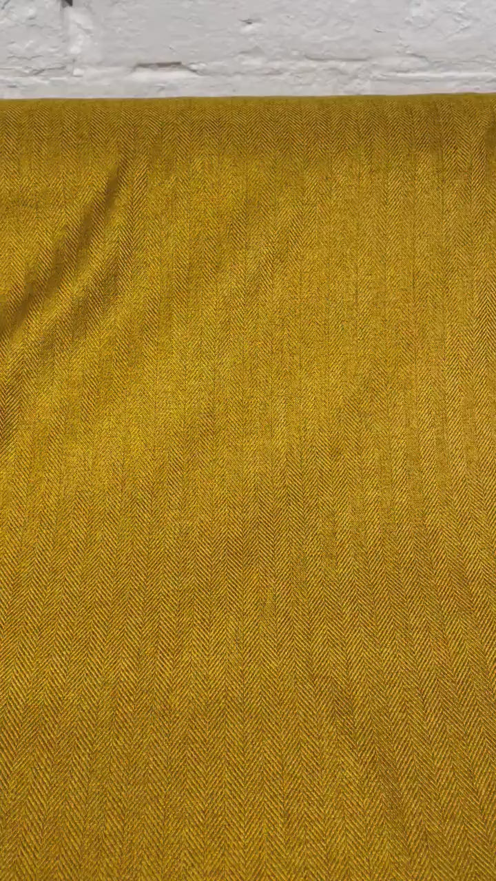 Tweed style fabric , 100% polyester.       Tweed, Colour-Ochre