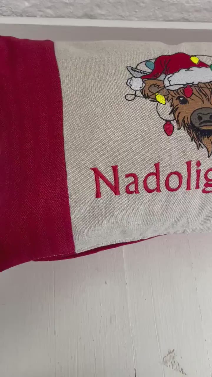 Festive Highland Cow with slights  - Nadolig Llawen-Merry Christmas. Red Tweed Fabric